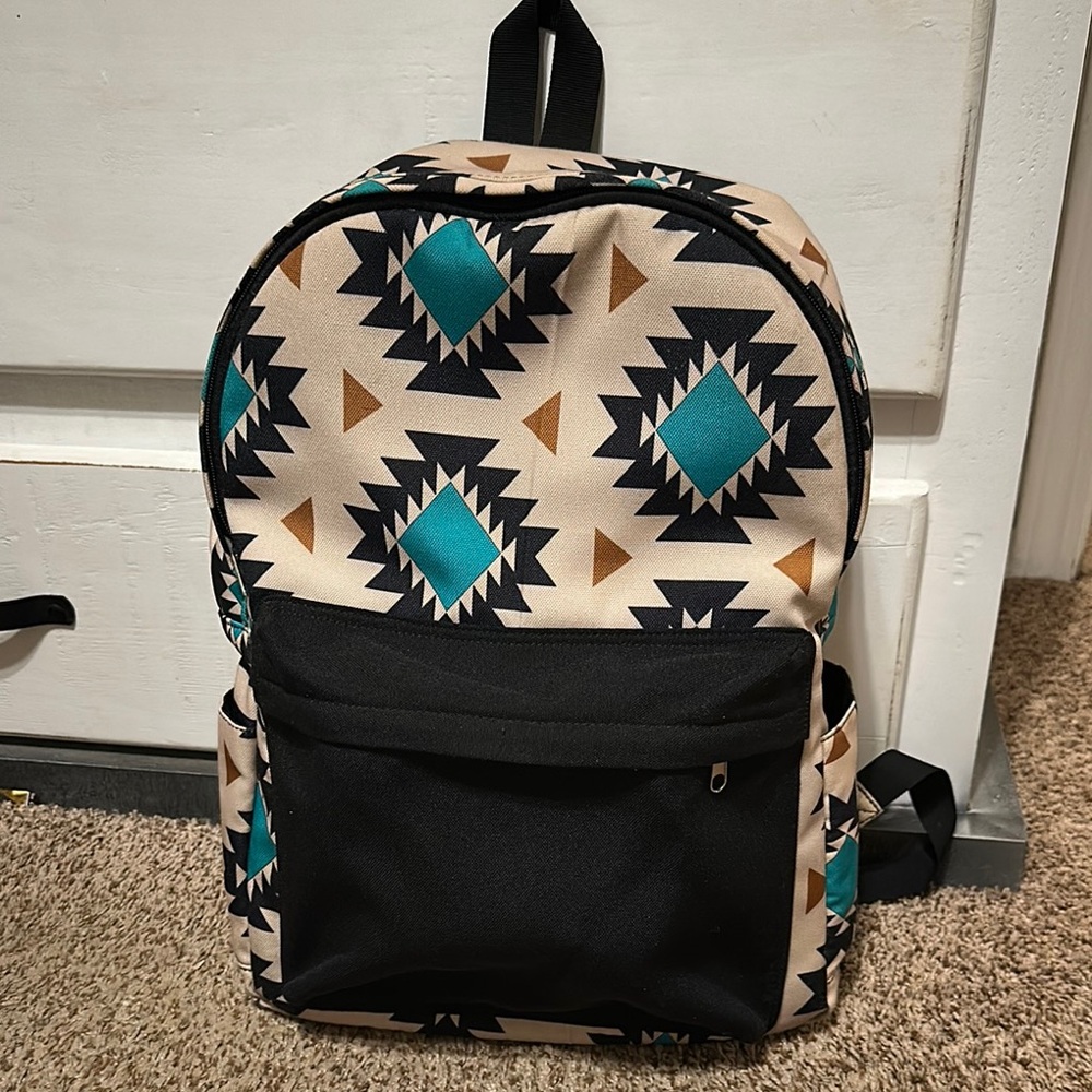 Aztec Patterned Backpack With Black Accents - image 1